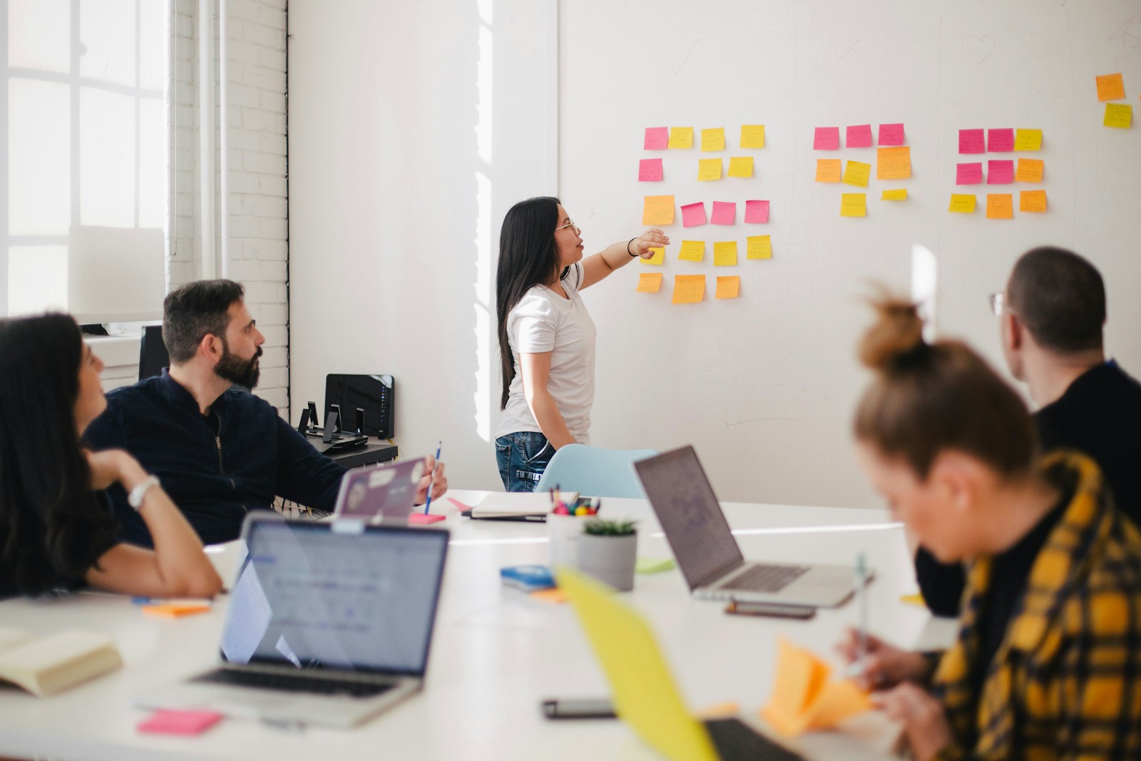 Whiteboard mapping an AI budgeting workflow in the studio